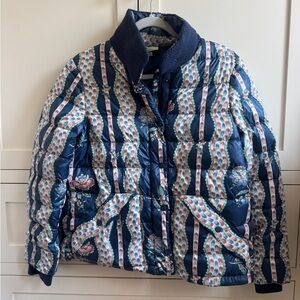 Tuckernuck blue quilted puffer coat with floral striped pattern